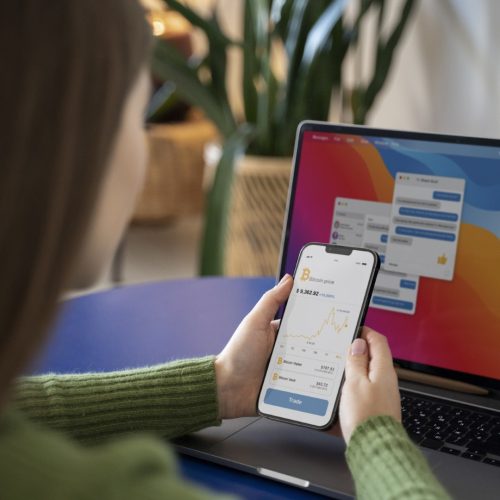 woman-searching-crypto-coins-using-her-smartphone-while-being-home